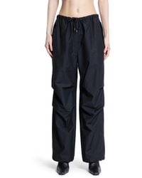 Acne Studios - Crinkled Cotton Nylon Baggy Trousers - Lyst
