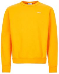 yellow crewneck sweatshirt