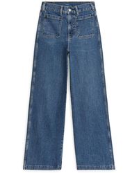 ARKET - Lupine High Flared Stretch Jeans - Lyst