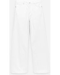 ARKET - Lupine Flared Jeans - Lyst