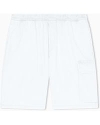 ARMANI EXCHANGE - Light Wash Denim Bermuda Shorts With A Used Effect - Lyst