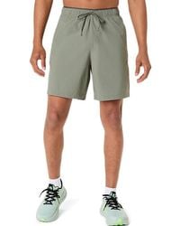 Asics - Comfort Core Stretch Woven 7In Short - Lyst