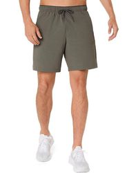 Asics - Comfort Core Stretch Woven 7In Short - Lyst