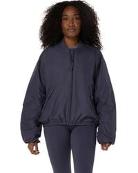 Asics - NAGINO LIGHT INSULATION JACKET - Lyst