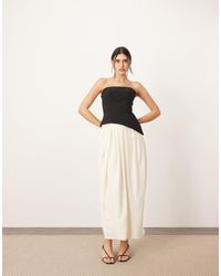 ARRANGE - Sculpted Bandeau With Drape Tulip Skirt Midi Dress - Lyst