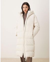 Mango - Doudoune longue à capuche - crème - Lyst