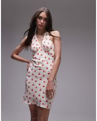 TOPSHOP - Vestido Corto Blanco Marfil Con Vuelo, Cuello Halter Y Estampado De Rosas De - Lyst