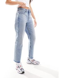 Mango - Jeans a zampa taglio corto azzurri - Lyst