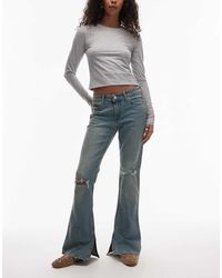 Levi's - Low Waist Slim Bootcut Jeans Van Denim Met Scheuren Bij De Knieën - Lyst