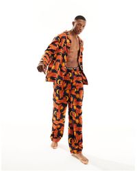 Chelsea Peers - – langer pyjama aus satin mit himmelskörper- und tigermuster - Lyst