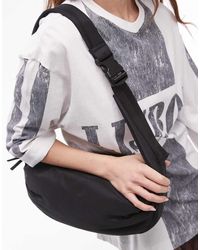 Rinonera negra con cadena Stradivarius de color Negro Lyst