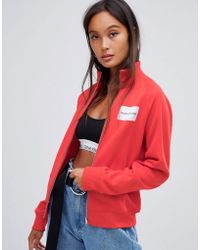 Calvin Klein Giacca della tuta con zip e logo a stemma - Rosso