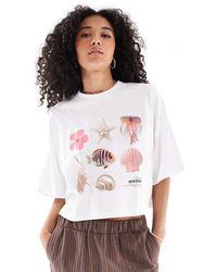 ONLY - T-Shirt Taglio Corto Bianca Con Grafica Con Conchiglie - Lyst