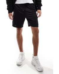 4505 - Performance Jersey Cargo Short - Lyst