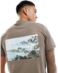ASOS - T-shirt à imprimé paysage au dos - marron - Lyst