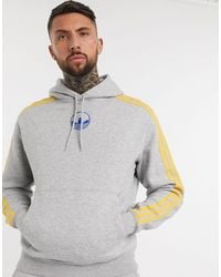 adidas originals rivalry hoodie with central trefoil logo in navy