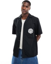 The North Face - Camicia a maniche corte squadrata nera con logo sulla tasca - Lyst