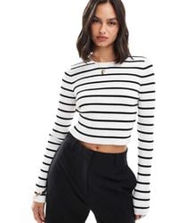 ASOS - Gebreide Gestreepte Top Met Lange Mouwen En Ronde Hals - Lyst