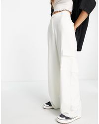 Pantalon cargo avec poche sur le côté écru Miss Selfridge en coloris Blanc élégants et chinos Treillis et pantalons cargo Femme Vêtements Pantalons décontractés 