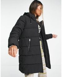 ONLY - – wattierter longline-mantel mit kapuze - Lyst