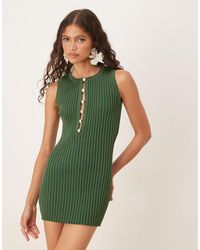 SNDY'S - Robe courte en maille côtelée avec découpe à perles nacrées - Lyst