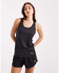 PUMA - Tad Essential Racerback Training Tank Top - Lyst