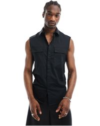 ASOS - Camisa negra sin mangas con bolsillos - Lyst