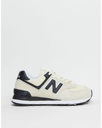 new balance 574 cream and rose gold trainers