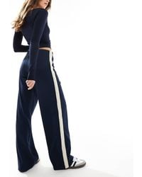 Vero Moda - Losse Broek Met Elastische Taille En Zijstreep - Lyst