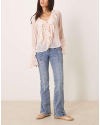 Gina Tricot - Jeans Met Lage Taille, Flared Pijpen En Details Aan De Voorkant - Lyst