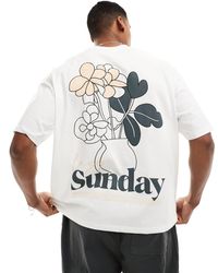 ASOS - T-shirt oversize bianca con stampa di fiori stile cartone sul retro - Lyst