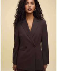 Stradivarius - Blazer double boutonnage ajusté à rayures - marron - Lyst