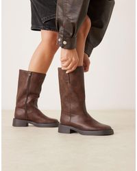ASOS - Colby - bottes camionneur à enfiler hauteur genou - marron - Lyst