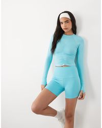 4505 - Icon Short Leggings Active A Vita Alta Con Interno Gamba 5 Pollici E Tasca Con Zip Per Telefono - Lyst