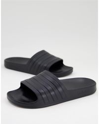 Sandalias negras adilette 22 adidas Originals de hombre de color Negro |  Lyst