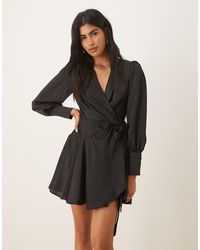 Glamorous - Peplum Hem Mini Wrap Dress - Lyst