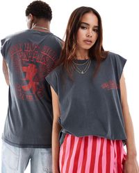 ASOS - Canotta oversize unisex slavato con stampa "red hot chilli peppers" - Lyst