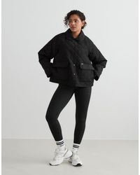 Aim'n - Giacca Da Donna Nera Trapuntata - Lyst