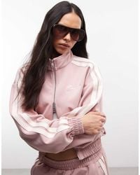 CERNUCCI - Funnel Neck Cropped Double-zip Jacket With Sleeve Taping - Lyst