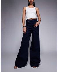 GOOD AMERICAN - Good Waist High Rise Wide Leg Palazzo Jeans - Lyst