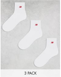 New Balance - Confezione da 3 paia di calzini medi bianchi con logo rosso - Lyst