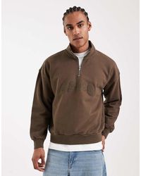 Levi's - Tonal Embroidered 1/4 Zip Sweatshirt - Lyst