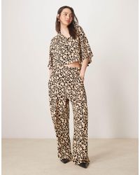 ASOS - Pantalon d'ensemble droit à enfiler avec imprimé animal - Lyst