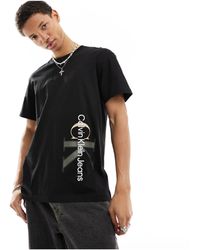 Calvin Klein - Camiseta negra con monograma del logo en dos tonos - Lyst