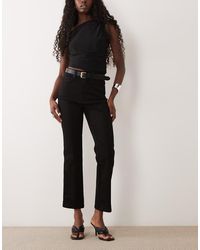 GOOD AMERICAN - Good Curve Never Fades Straight Jeans - Lyst