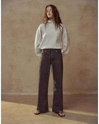 Pull&Bear - Low-rise Flared Corset Jeans - Lyst