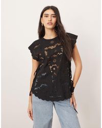 ARRANGE - Cotton Cutwork Embroidered Top With Tie Side - Lyst