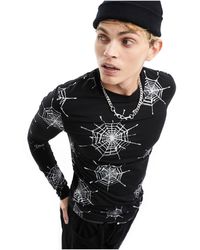ASOS - T-shirt attillata a maniche lunghe per halloween nera con stampa di ragnatela glitterata - Lyst