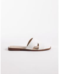 SEQWL - – storke – flache sandalen - Lyst