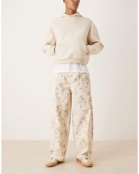 ASOS - – weite oversize-hose mit bundfalten und military-muster - Lyst
